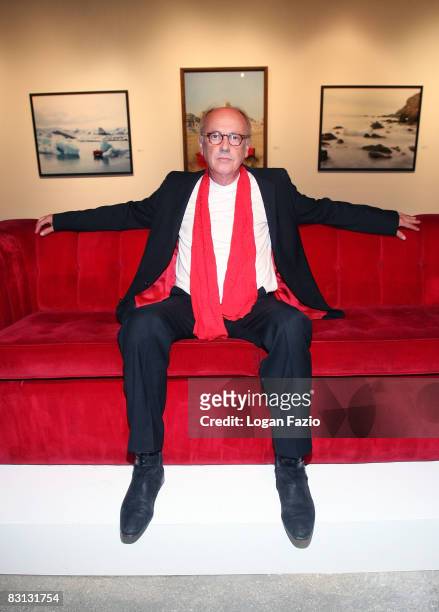 Fine art photographer Horst Wackerbarth poses on "The Red Couch", the inaugural exhibition of photographic artwork by Wackerbarth at Wolfgang Roth &...