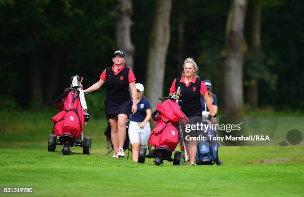 Lucy Jones and Lea-Anne Bramwell of Wales walk down the 13th fairway during The Ladies' and Girls' Home Internationals at Little Aston Golf Club on...