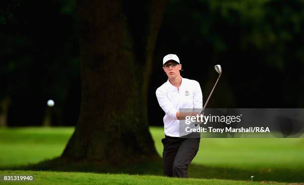 Olivia Winning of England plays out of a bunker on to the 13th green during The Ladies' and Girls' Home Internationals at Little Aston Golf Club on...