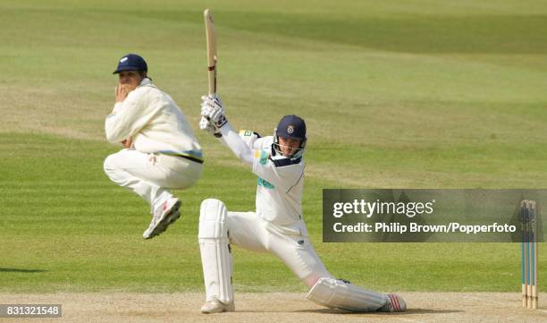 Michael Lumb of Hampshire has Jacques Rudolph of Yorkshire leaping out of the way of a shot during the County Championship match between Hampshire...