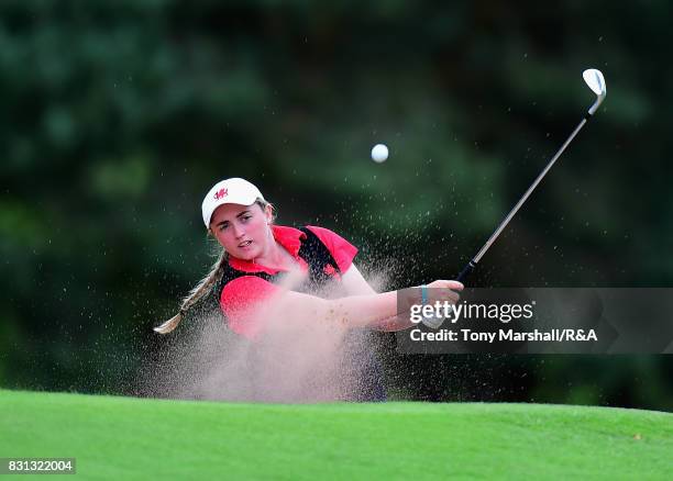Jordan Ryan of Wales plays out of a bunker on to the 3rd green during The Ladies' and Girls' Home Internationals at Little Aston Golf Club on August...