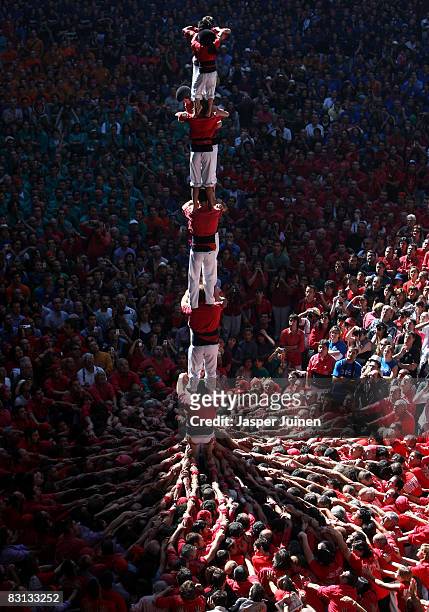 Castellers of the Colla Jove Xiquets de Tarragona 'colle' build a human tower during the 22nd Tarragona Castells Competition on October 5, 2008 in...