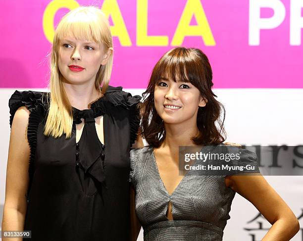 Movie "Make Yourself at Home" actress Song Hye-Kyo and Athena Currey pose during a press conference at the 13th Pusan International Film Festival on...