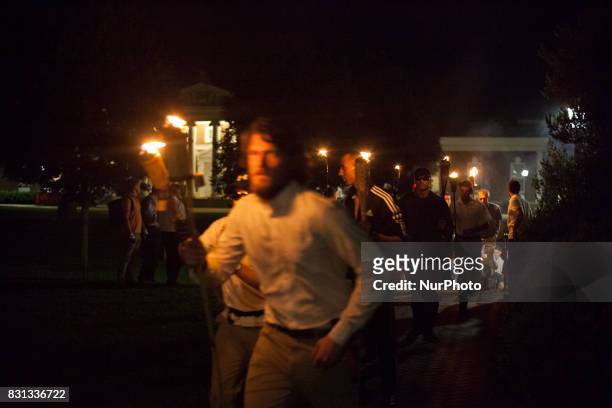 Neo Nazis, Alt-Right, and White Supremacists take part a the night before the 'Unite the Right' rally in Charlottesville, VA, white supremacists...