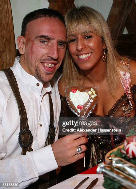 Franck Ribery of Bayern Muenchen and his wife Wahiba attend the Kaefer beer tent during the Oktoberfest beer festival on October 5, 2008 in Munich,...