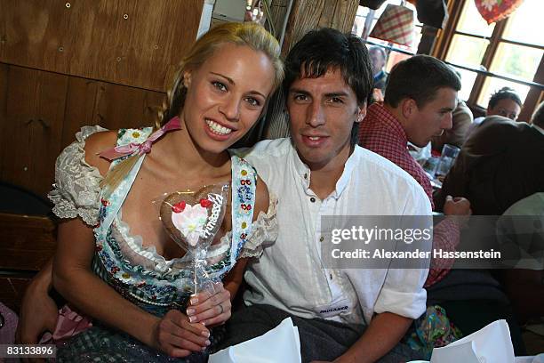 Jose Ernesto Sosa of Bayern Muenchen and his girlfriend Carolina attend the Kaefer beer tent during the Oktoberfest beer festival on October 5, 2008...