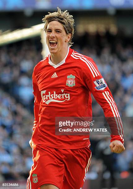 Liverpool's Spanish forward Fernando Torres celebrates after scoring his second goal during the English Premier league football match against...
