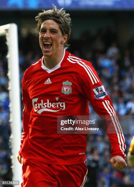 Fernando Torres of Liverpool celebrates scoring his team's second goal during the Barclays Premier League match between Manchester City and Liverpool...