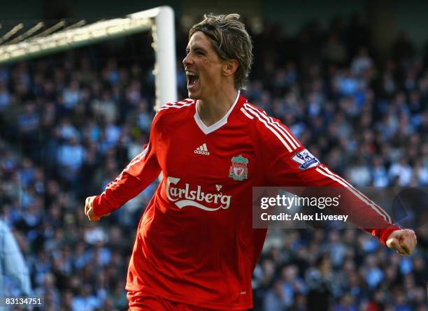 Fernando Torres of Liverpool celebrates scoring his team's second goal during the Barclays Premier League match between Manchester City and Liverpool...