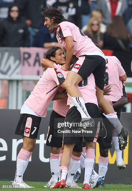 Palermo players celebrate during the Serie A match between Juventus and Palermo at the Stadio Olimpico on October 05, 2008 in Tourin, Italy.