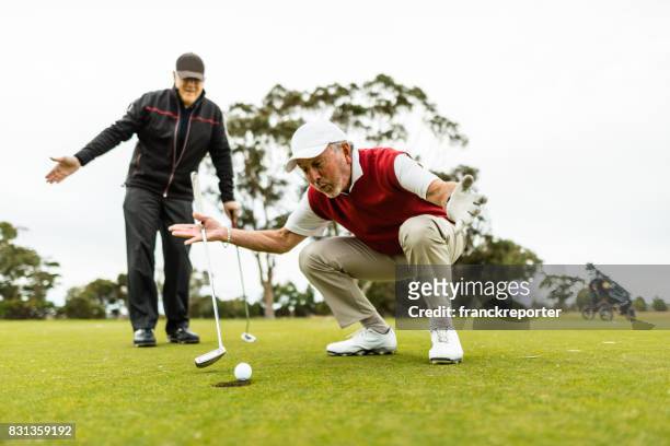 golf player hope to make it - golfer putting stock pictures, royalty-free photos & images