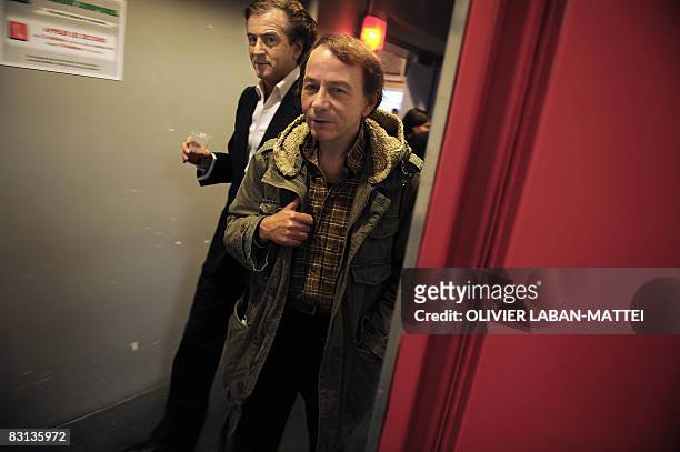 French best-selling author Michel Houellebecq and Bernard-Henri Levy leave, on October 5 the France 2 state TV news set by anchorman Laurent...