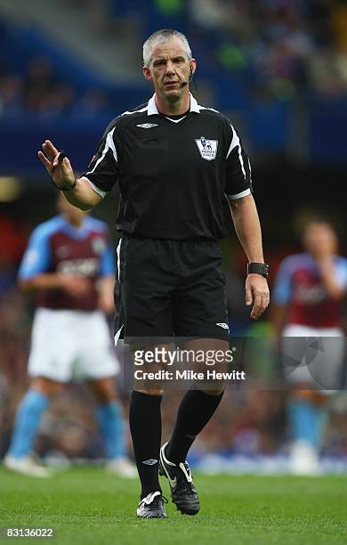 Referee Chris Foy looks on during the Barclays Premier League match between Chelsea and Aston Villa at Stamford Bridge on October 5, 2008 in London,...