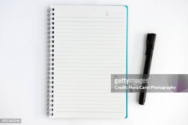 overhead view of note pad and pen - books and book open nobody imagens e fotografias de stock