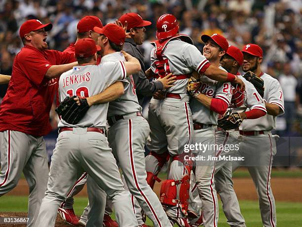 The Philadelphia Phillies celebrate the final out against the Milwaukee Brewers in game four of the NLDS during the 2008 MLB playoffs at Miller Park...