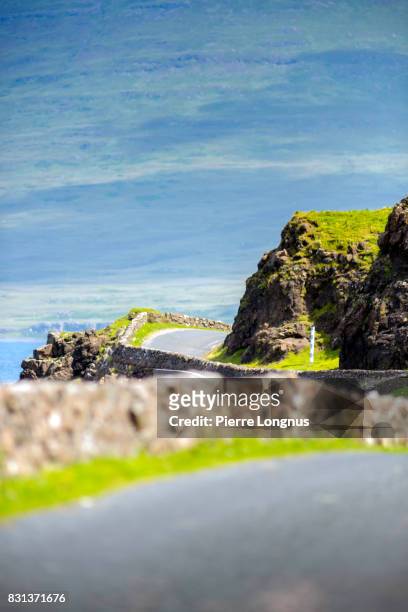winding road b8035 along loch na keal, principal sea loch on atlantic coastline of the island of mull, in the inner hebrides, argyll and bute, scotland. - sea loch stock pictures, royalty-free photos & images