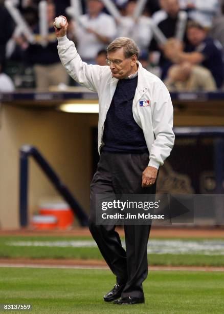 Major League Baseball commissioner Bud Selig waves to the crowd before throwing out the ceremonial first pitch before the Milwaukee Brewers play the...