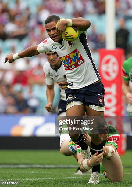 Josh Hoffman of the Broncos is tackled during the Under 20's Toyota Cup Final match between the Canberra Raiders and the Brisbane Broncos at ANZ...