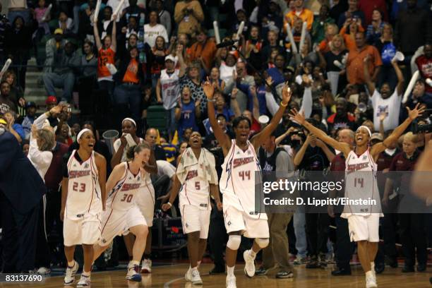 Plenette Pierson, Katie Smith, Elaine Powell, Taj McWilliams-Franklin and Deanna Nolan of the Detroit Shock celebrate after the win against the San...