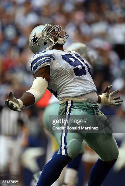 Tackle Jay Ratliff of the Dallas Cowboys celebrates a defensive tackle against Cedric Benson of the Cincinnati Bengals at Texas Stadium on October 5,...