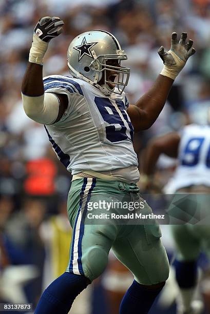 Tackle Jay Ratliff of the Dallas Cowboys celebrates a defensive tackle against Cedric Benson of the Cincinnati Bengals at Texas Stadium on October 5,...