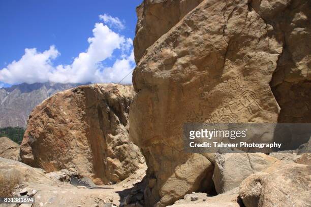 haldeikish: the sacred rocks of hunza - markhor stock-fotos und bilder