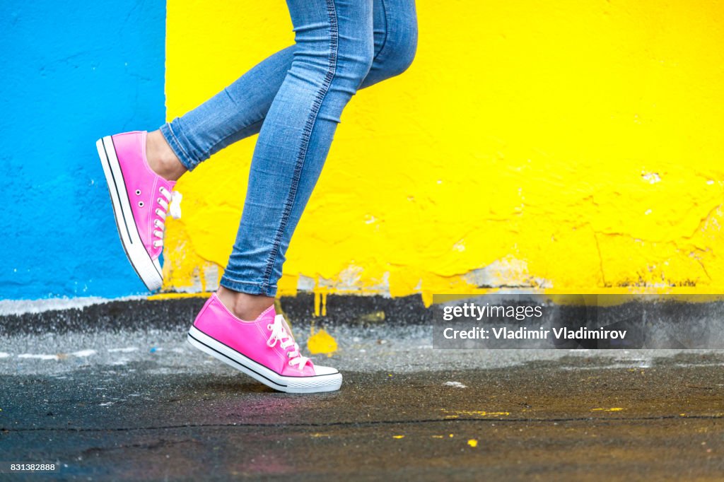 Woman in pink sneakers