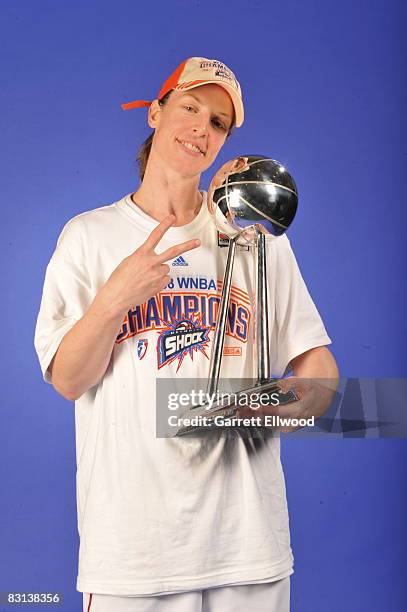 Katie Smith of the Detroit Shock poses for a portrait with the Championship Trophy after winning Game Three of the WNBA Finals against the San...