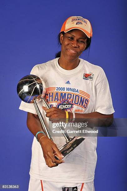 Taj McWilliams-Franklin of the Detroit Shock poses for a portrait after winning Game Three of the WNBA Finals against the San Antonio Silver Star on...