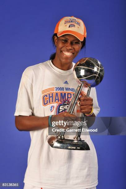 Taj McWilliams-Franklin of the Detroit Shock poses for a portrait after winning Game Three of the WNBA Finals against the San Antonio Silver Star on...