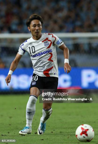 Shu Kurata of Gamba Osaka in action during the J.League J1 match between Gamba Osaka and Jubilo Iwata at Suita City Football Stadium on August 13,...