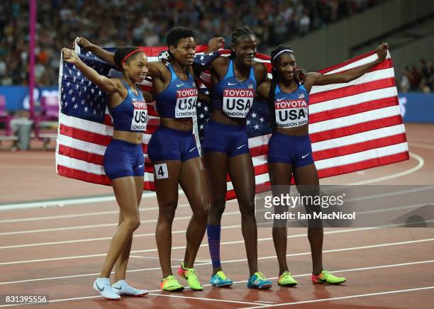 Allyson Felix, Phyllis Frances, Shakima Wimbley and Quanera Hayes of United States celebrate victory in the Women's 4x400m Relay final during day ten...