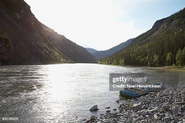 rafts at river's edge, view of valley - northwest territories stock pictures, royalty-free photos & images