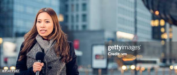female newsreader - newsreader stock pictures, royalty-free photos & images