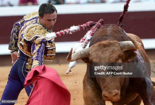 Spanish matador Rafaelillo performs a pass on a Pedraza de Yeltes bull in the Dax Arena during the Dax Festival, southwestern France, on August 14,...