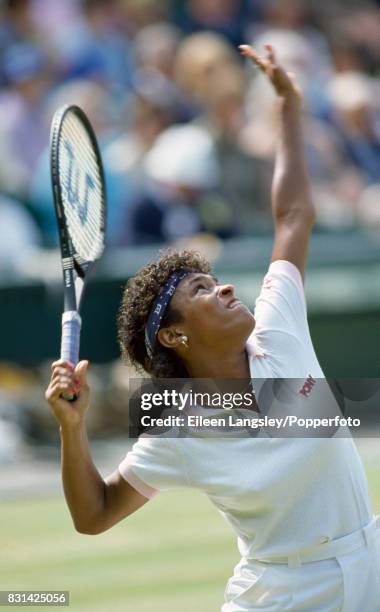 Zina Garrison of the USA in action during a women's singles match at the Wimbledon Lawn Tennis Championships in London, circa June, 1984. Garrison...