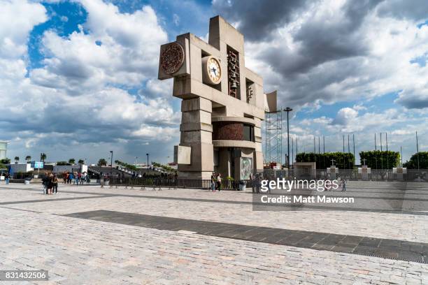 clock tower on the great plaza of the basilica of our lady of guadalupe. mexico city - mexico city clock tower stock pictures, royalty-free photos & images