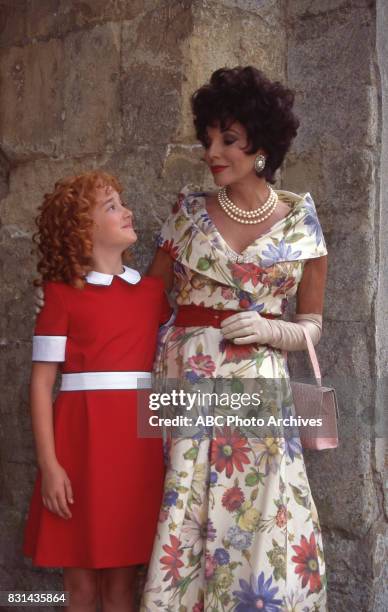 Ashley Johnson and Joan Collins in 'Annie: A Royal Adventure!' 1995