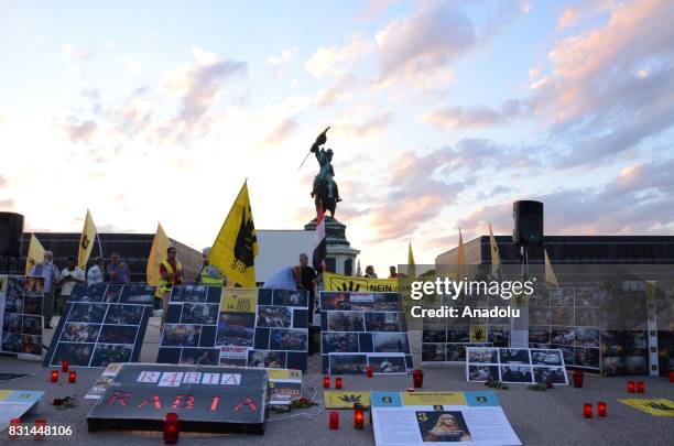 Street exhibition commemorating Rabaa El Adaweya massacre victims is seen as people gather during a protest marking the fourth anniversary of Rabaa...