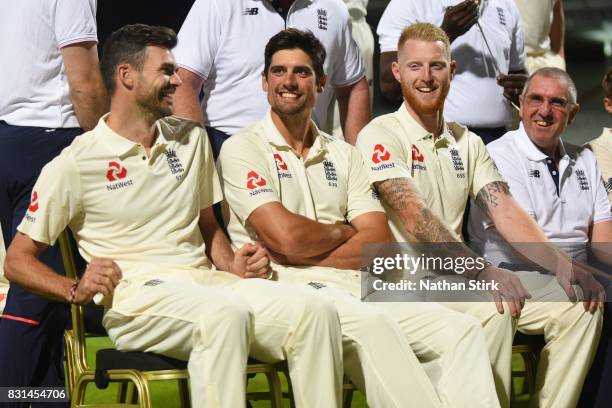 James Anderson, Alastair Cook and Ben Stokes of England look on during a team photograph after the England Net Session at Edgbaston on August 14,...