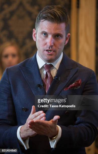 White nationalist Richard Spencer speaks to select media in his office space on August 14, 2017 in Alexandria, Virginia. Spencer, head of the...