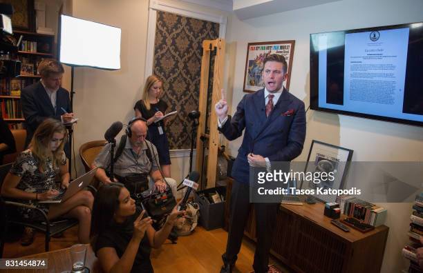 White nationalist Richard Spencer speaks to select media in his office space on August 14, 2017 in Alexandria, Virginia. Spencer, head of the...