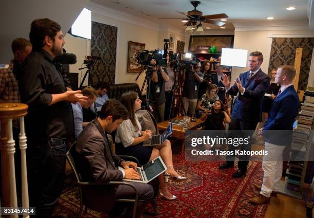 White nationalist Richard Spencer and Nathan Damigo of Identity Evropa speak to select media in a building serving as office space on August 14, 2017...