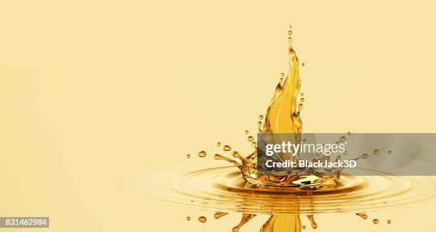 splash of oil leaf - cream splash stock pictures, royalty-free photos & images