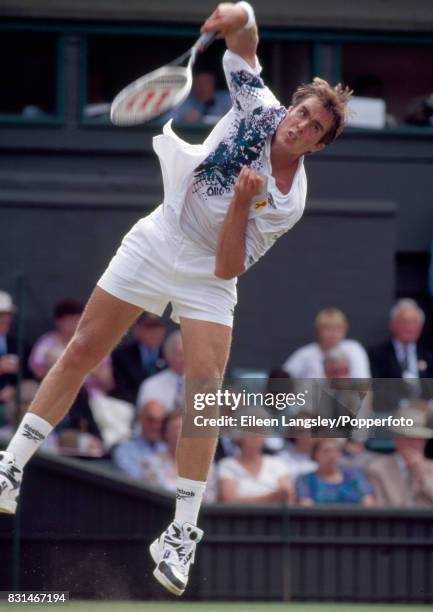 Todd Martin of the USA in action during a men's singles match at the Wimbledon Lawn Tennis Championships in London, circa July 1994. Martin was...