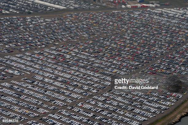 In this aerial photo imported cars are stored at Sheerness open car storage area awaiting delivery to car dealer's showrooms on October 1, 2008 in...