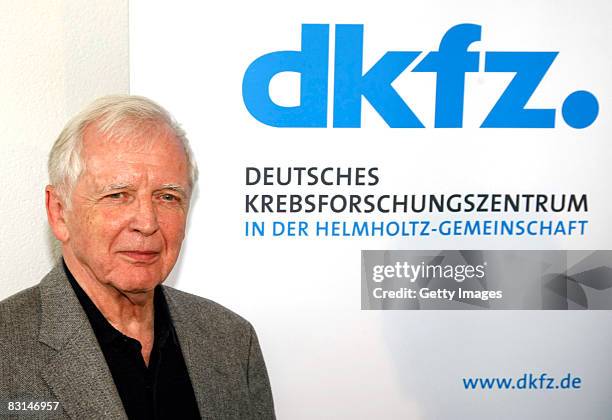 German scientist Harald zur Hausen poses for the press at the German Cancer Research Center on October 6, 2008 in Heidelberg, Germany. Zur Hausen who...