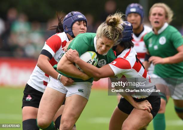 Alison Miller of Ireland is tackled by Mayu Shimizu of Japan during the Womens Rugby World Cup 2017 Pool C game between Ireland and Japan at UCD Bowl...