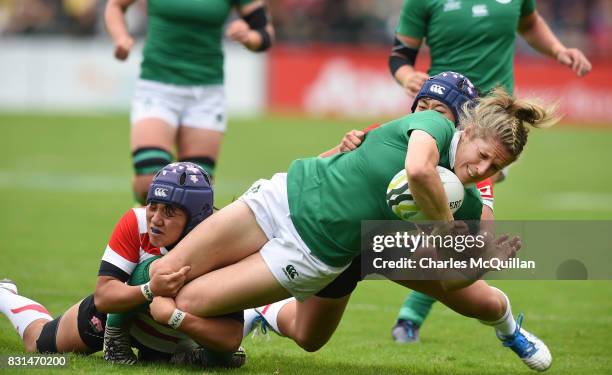 Alison Miller of Ireland is tackled by Mayu Shimizu of Japan during the Womens Rugby World Cup 2017 Pool C game between Ireland and Japan at UCD Bowl...