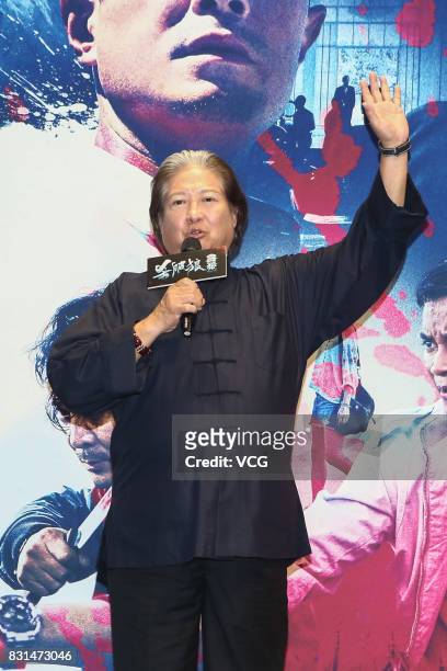 Actor Sammo Hung arrives at the red carpet of the premiere of film "Paradox" on August 14, 2017 in Beijing, China.